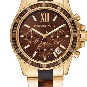 Gold Michael Kors watch, received as a gift and never worn. Great condition.